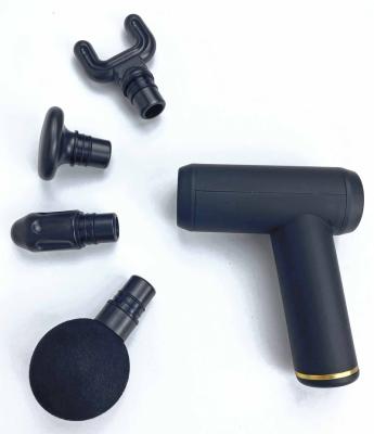 China Beauty Salon Mini Handy Electric Muscle Deep Tissue Muscle Massager Gun For Sports Rechargeable With 4 Gun Heads for sale