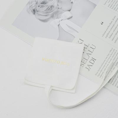 China Envelope Shaped White Microfiber Jewelry Pouch Set Custom Jewelry Packaging Bag With Band Tie Gold Logo for sale