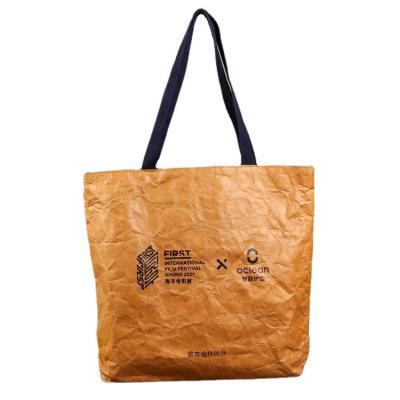 China Special handled Dupont kraft paper material washable bag can be printed logo anti-tear tote bag advertising rotten bag for sale