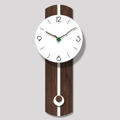 China GIVE INSTRUCTIONS New Design Unique Artistic Acrylic Wooden Leaf Pointer Swinging Wall Clock for sale