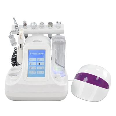 China 8 in 1 Whitening Beauty Facial Equipment Tool Cleaning Ultrasonic Skin Peeling Device for sale