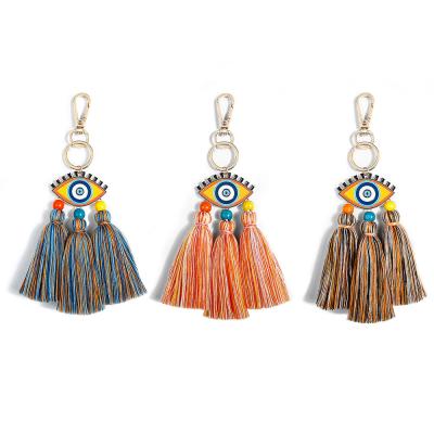 China Decorative Hanging Ornaments Evil Eye Key Chain Boho Tassel Key Chains For Lady Bag Accessories for sale