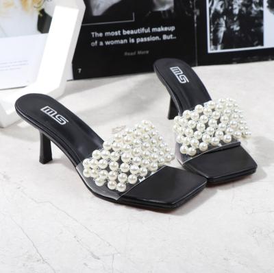 China 2022 Fashion Trend Sandals Women Shoes Natural Rattan Grass Weaving Simple And Comfortable Pearl Tied Sandals For Ladies for sale