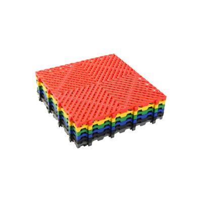 China Modern 25 Pack Thickness 1.8cm splicing floor grille garage plastic flooring Interlocking PP Flexible plastic floor tile for car room for sale