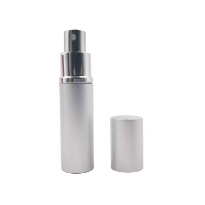 China Fancy Spray Pump Chemical Crown 30ml Small Spray Aluminum Perfume Bottle for sale