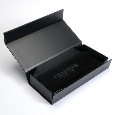 China Custom Hot Stamping Logo Matte Black Folding Magnetic Closure Recyclable Paper Gift Box With Flannel Bag for sale