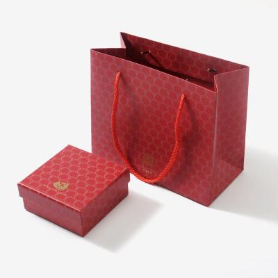 China Handmade Custom Printed Your Own Logo Red Paper Bag With Handle Jewelry Paper Bag for sale