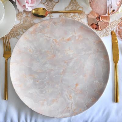 China Custom Viable Luxury Pink Marble Tableware Fancy Decorative Ceramic Charger Dish With Gold Rim for sale