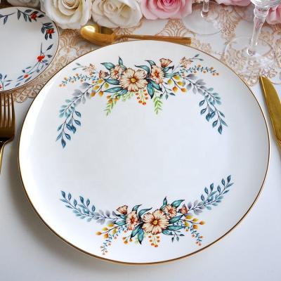 China New Design Sustainable Ceramic Charger Plates Gold Bone China Decorative Fine Dishes For Luxury Wedding for sale