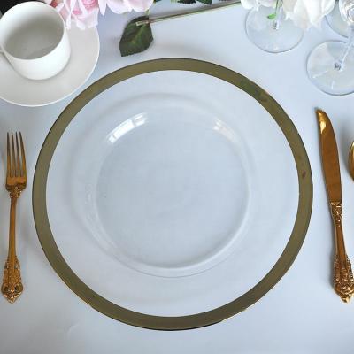 China Sustainable Luxury Royal Hotel Dining Tableware Width Glass Gold Rim Charger Glass Plate For Wedding Rent for sale