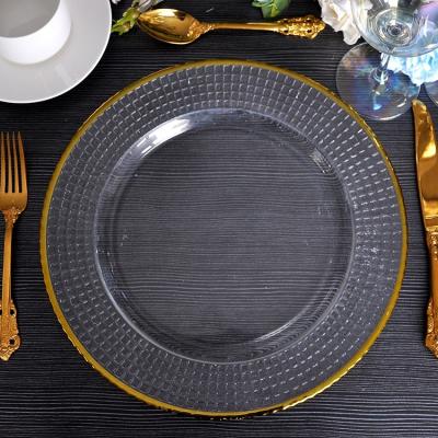 China Sustainable Luxury Clear Gold Rim Glass Tableware Royal Banquet Trivets Wedding Cups Charger Dishes for sale