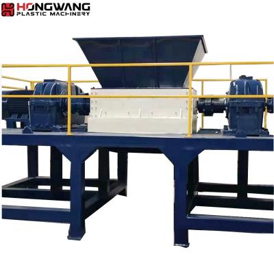 China Garment Shops Low Speed ​​Plastic Metal Shredding Twin Shaft Waste Tire Shredder for sale