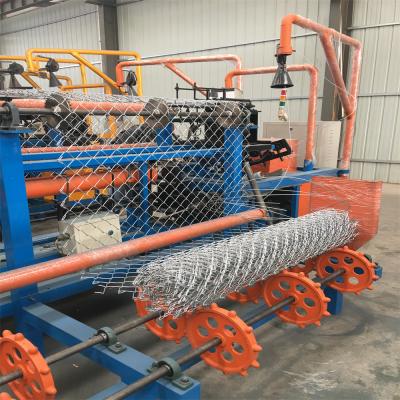 China Building Material Shops GST Fully Automatic Galvanized Double Wire Chain Link Fence Weaving Machine Machinery in China for sale