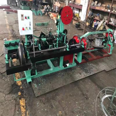 China Building Material Shops GST High Speed ​​Automatic Defense Twisted Barbed Wire Making Machine for sale