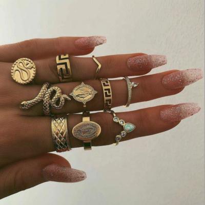 China UNIQ Boho Ring Set CLASSIC Gold Gem Joint Knuckle Ring Rhinestone Mid Finger Rings for Women and Girls for sale