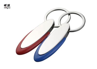 China Oval Shaped Custom Rubber Key Rings Blank , Laser Engraved Logo Personalised Business Keyrings for sale