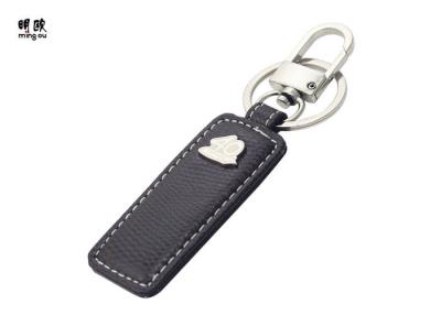 China Shiny Nickel Mens Leather Key Holder With Laser Engraved Stainless Sheet Logo for sale