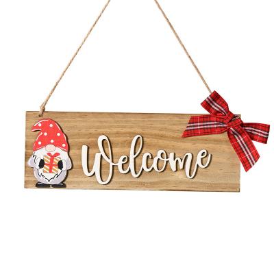 China Christmas Specifications Export 28*10cm Hanging Bow Wooden Door 100 PC New Year Square Welcome Christmas Door for sale