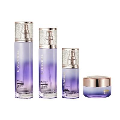 China High End Customized Cosmetic Package White Color Glass Bottle Set Cosmetic Round Skin Care Glass Bottles Set for sale