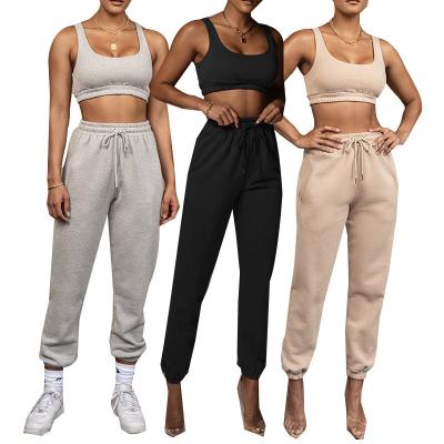 China 2021 New Arrivals Women Anti-Wrinkle Side Pocket Solid Drawstring Elastic Flap Detail Tank Top And Pant Set for sale