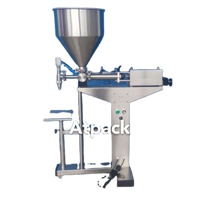 China High Accuracy Semi-automatic CLOTHING Atpack Honey Jar Filling Machine With CE GMP for sale