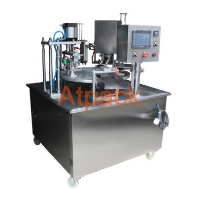 China Rotary Type Ice Cream APPAREL Atpack Cup Filling And Sealing Machine for sale