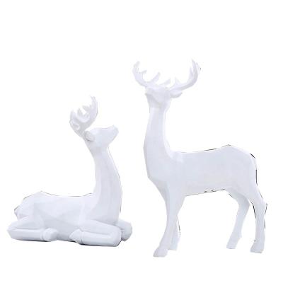 China Global Geometry Reindeer Gifts Resin Creative Flocking Decoration For Home Living Room for sale