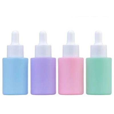 China 30ml cosmetic matte rose purple color essential oil shoulder dropper blue green glass flat bottles for sale