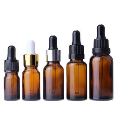 China 5ml 10ml 15ml 20ml 30ml 50ml 100ml essential oil glass cosmetic amber bottle with dropper for sale