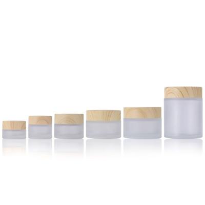 China LOW MOQ 5g 10g 15g 20g 30g 50g 100g Personal Care Gel Glass Cream Jar Bottle With Wood Grain Cap for sale