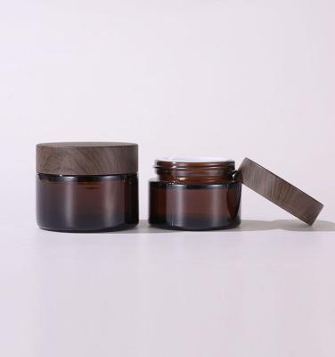 China Personal Care Containers 5g 10g 15g 20g 30g 50g 100g Cosmetic Glass Jar Cream Bottle With Bamboo Cap for sale