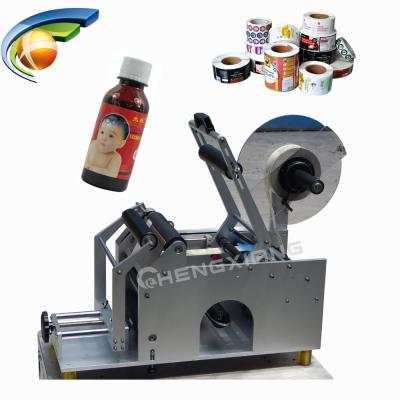 China Beverage factory price manual sticker labeling machine for bottles, stick manual labeling machine for sale