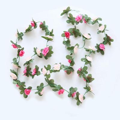 China Pancake + plastic flower vine e-commerce selling rose small decorative flower hot imitation plastic rose border for sale