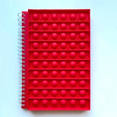 China XUCHUN Spiral Spiral Notebook for Kids Jigsaw Puzzle School Diary Noise Push Silicone Wholesale A5 Happy Notebook for sale