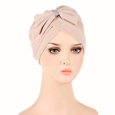 China 2022 Ethnic Islamic Hair Caps Bowknot Accessories Women Turban India Headwear Turban Hats Popular Muslim Inner Hood Hijabs for sale