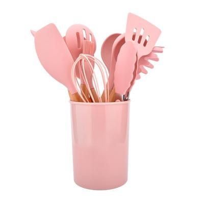 China Sustainable Silicone Utensils Kitchen Set Silicon Tools Kitchenware With Wooden Handle for sale