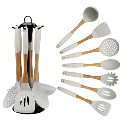 China Sustainable Silicone Kitchen Utensils Set Cooking Tools With Wooden Handle Non-slip Cookware for sale