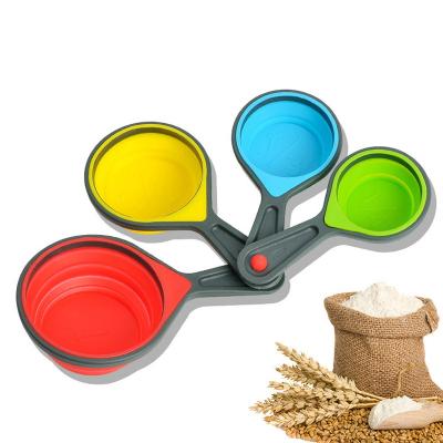 China Viable Set of 5 Amazon Hot Sale Silicone Folding Portable Measuring Cups Set Tool Folding Measuring Spoon for sale