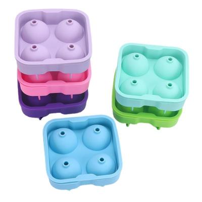 China Sustainable Home Made 4 Cavity Round Silicone Ice Cream Molds Ice Cube Ball Tray Making Mold Ice Ball Maker for sale