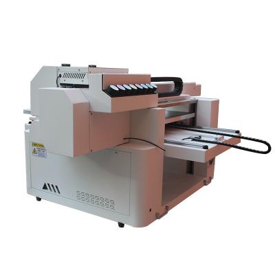 China Newest 2023 UV Flatbed Printer Varnish Inkjet Printing Machine 3 Print Head 60cx90cm A1 Size For Hotels for sale