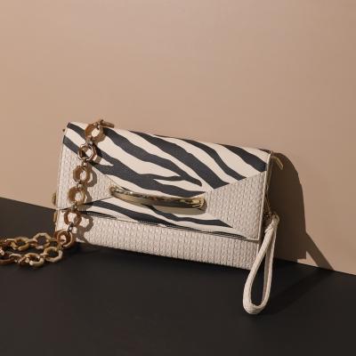 China Custom Urban Style Product Bags Women Handbags Ladies Handbags For Women Ladies Luxury Evening Clutch Bags Animal Print Envelope Clutch for sale