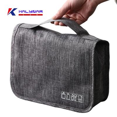 China Fashion Wholesale Ladies Fashionable Portable Foldable Polyester Cosmetic Fabric Make Up Bag And Case Bag OEM High Quality Toiletry Cases for sale