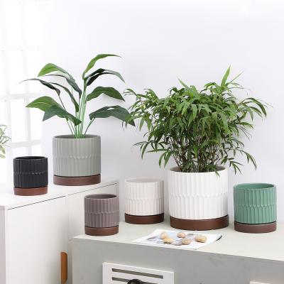 China Nordic Minimalist Modern Ceramic Plant Succulent Pots With Tray For Indoor Plants Flower Pots And Planters Pots Wholesale Home Decor for sale