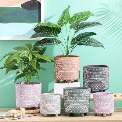 China Nordic minimalist cement flower pot vase garden planter table pot with foot decoration wholesaler china outdoor indoor vase for sale