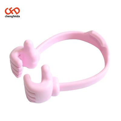 China Beautiful PORTABLE thumbs modeling stand for cell phone OK holder for smartphone for sale