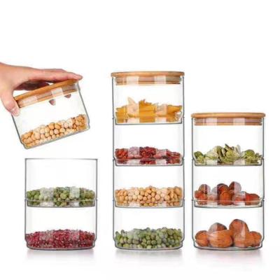 China Microwavable Clear Stackable Glass Jar Of Three Glass Containers With Bamboo Lid For Kitchen Storage for sale