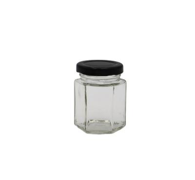 China Honey Empty Hexagon Honey Jar Glass Jar Hexagon Glass Jars For Honey for sale