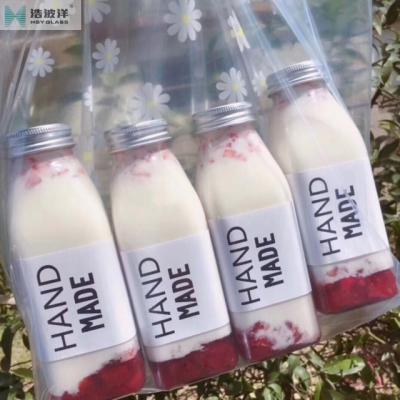 China Beverage 350ml Square Milk Beverage Glass Bottle With Aluminum Cap for sale