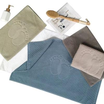 China Washable 100% Cotton Hotel Bathroom Jacquard Bath Floor Mat Non Slip for sale