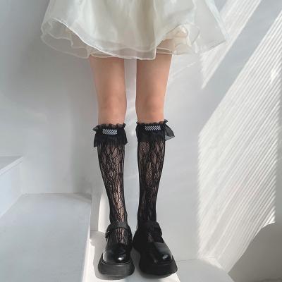 China QUICK DRY Girls Tulle Lace Up Socks Black And White Flower Edge Tube Lace Socks for sale